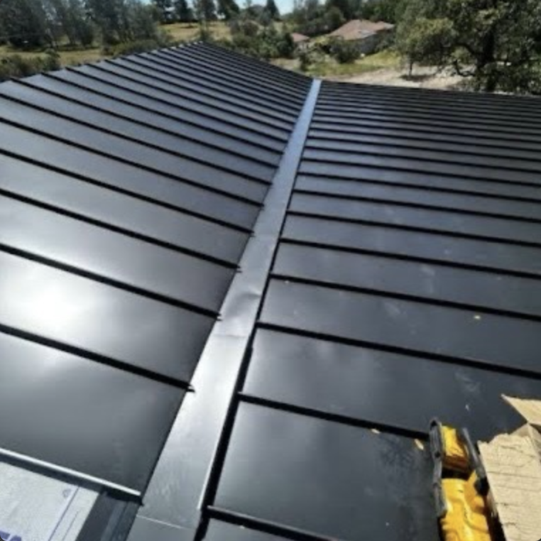 Close view of standing seam metal roof panels on a Sacramento new construction home