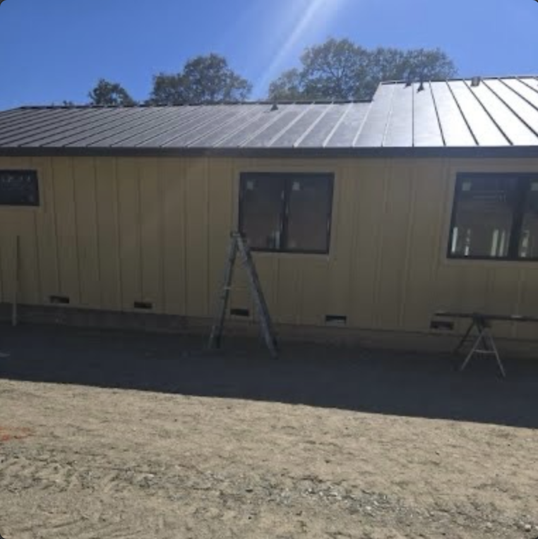 Standing seam metal panels on a Sacramento-area residential roof