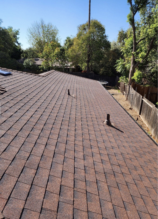 Completed brown shingle roof replacement